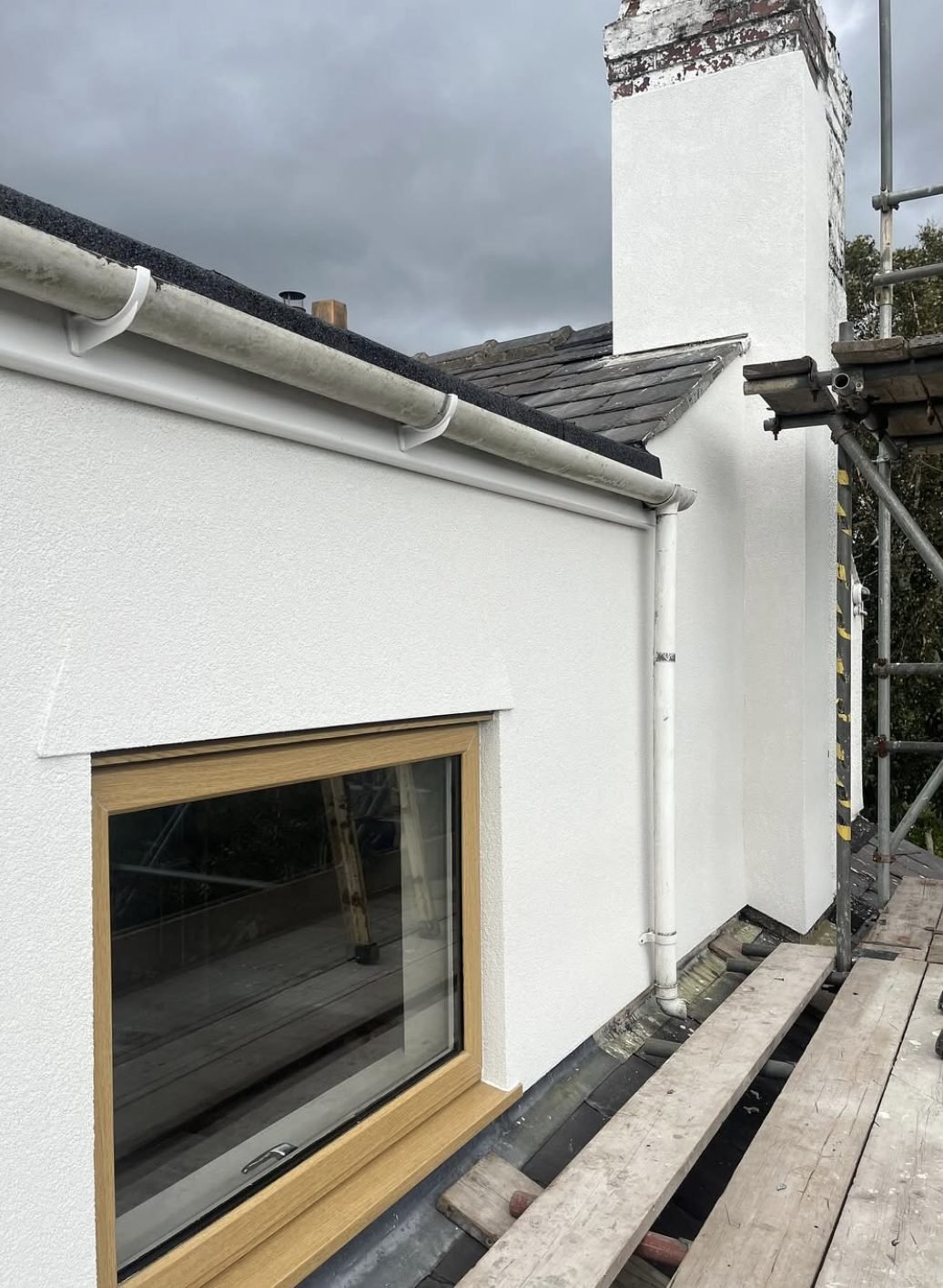 Chimney stack and dormer side in new render, seen from scaffold