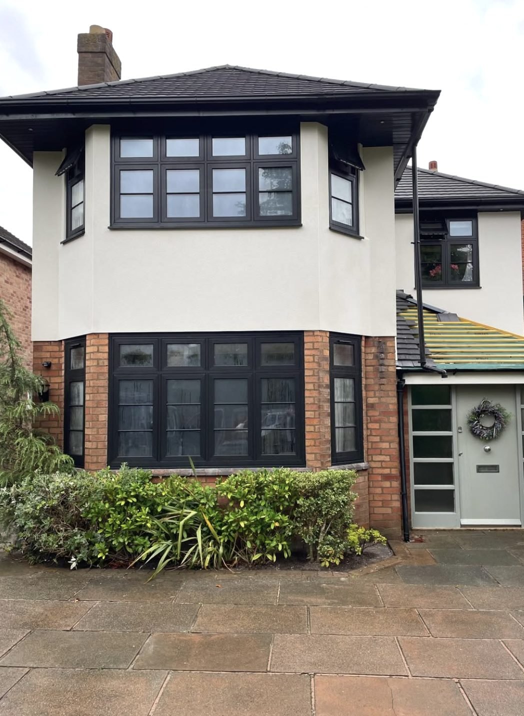 Semi with render on the upper bay and brick on the ground floor